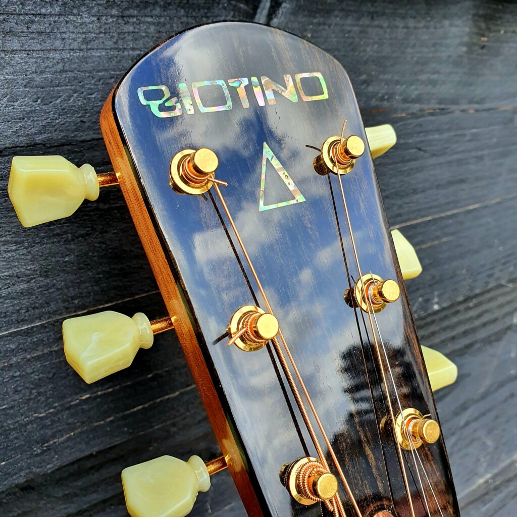 guitar headstock with Giotino logo